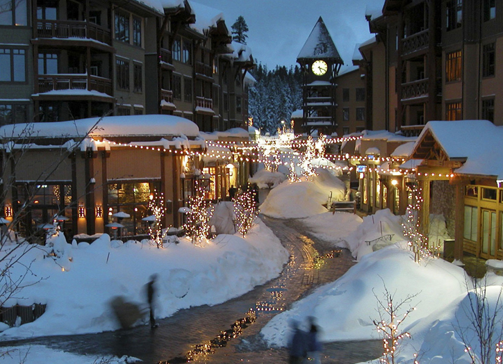 Mammoth Lake Village at night covered in snow